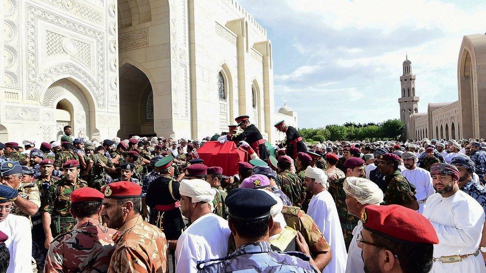 Mourners carry the coffin of late Sultan Qaboos during the funeral in Muscat