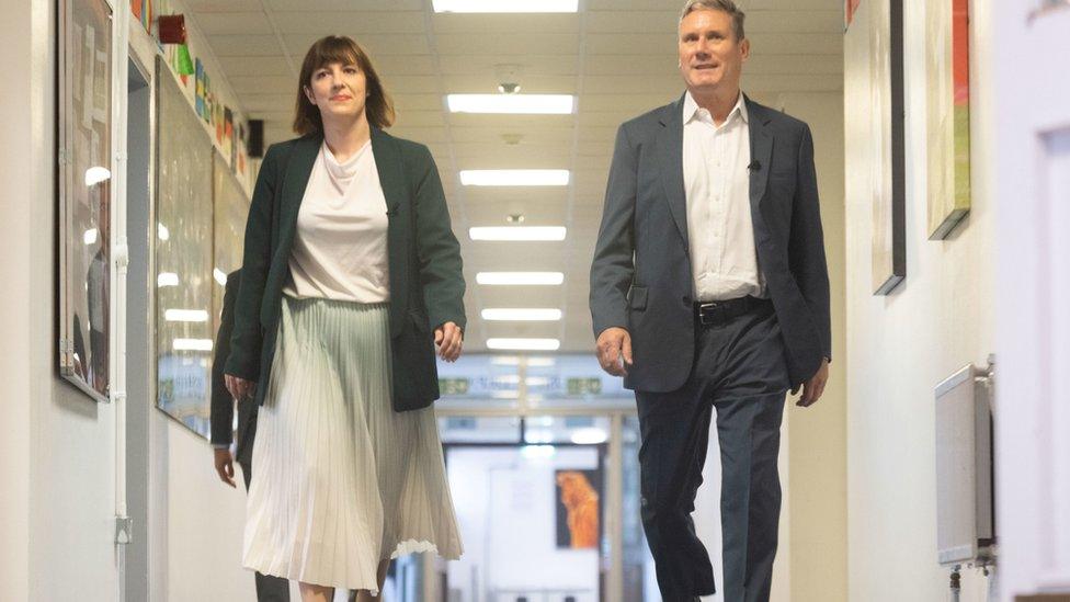 Bridget Phillipson and Keir Starmer walk through school hallway