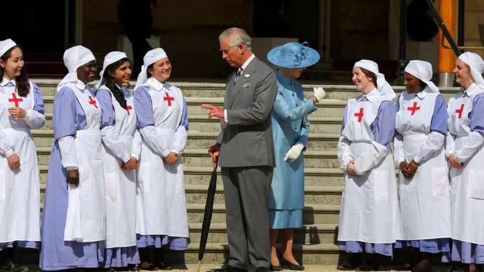 Prince-Charles-and-British-Red-Cross-workers.