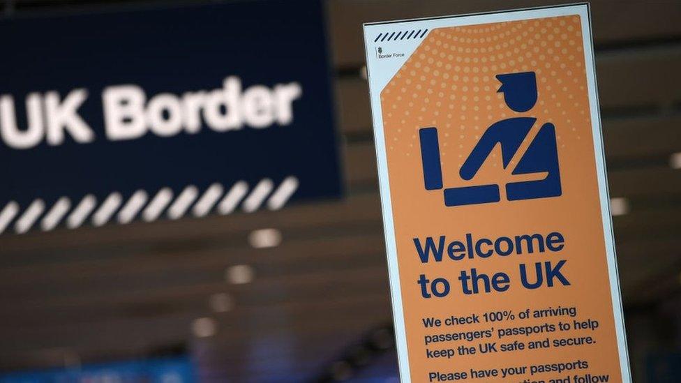 UK border signage at passport control in Arrivals in Terminal 2 at Heathrow Airport