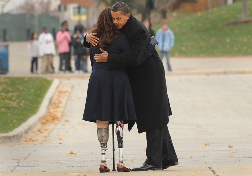 Barack Obama (L) embraces Iraqi war veteran and Illinois State Director of Veterans Affairs, Tammy Duckworth (R), - November 2008