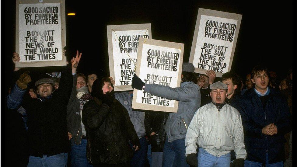 Printworkers demonstrating on picket line outside newspaper owner Rupert Murdoch's Wapping, London plant