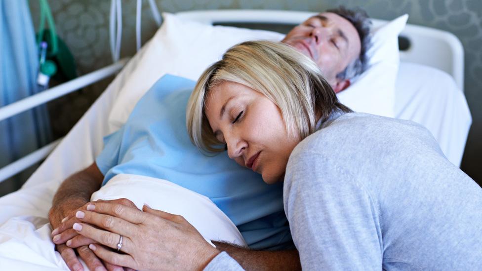 Patients trying to sleep on hospital ward