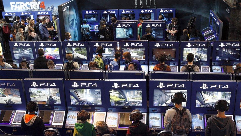 PlayStation gamers gather for International Games Week, October 29, 2014 in Paris, France