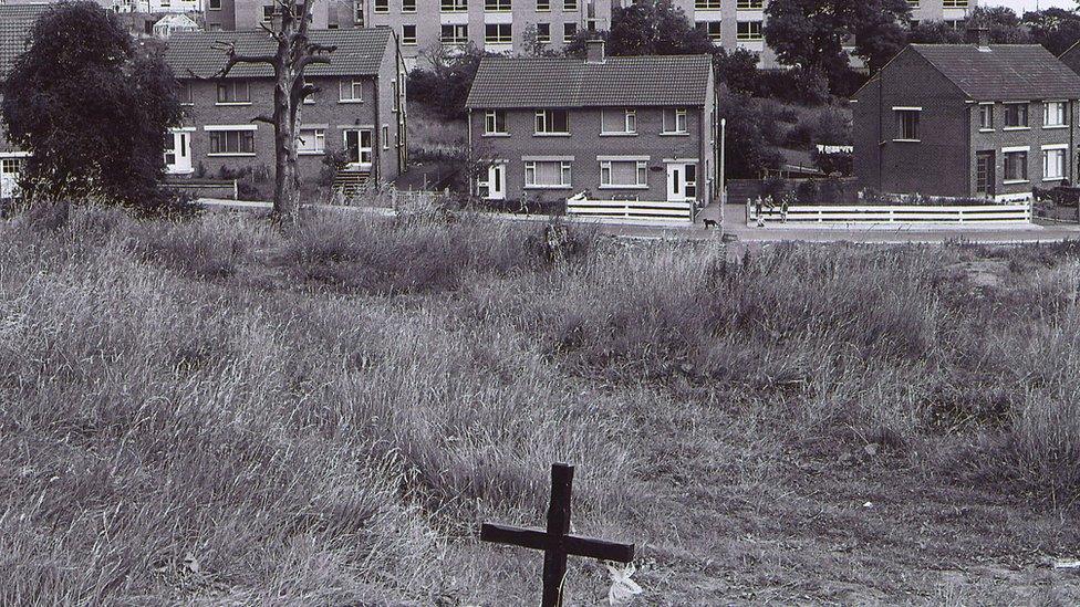 A cross in field in the Ballymurphy area