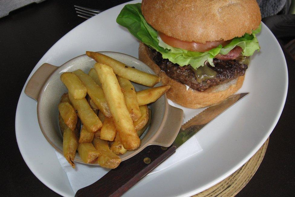 A burger and chips