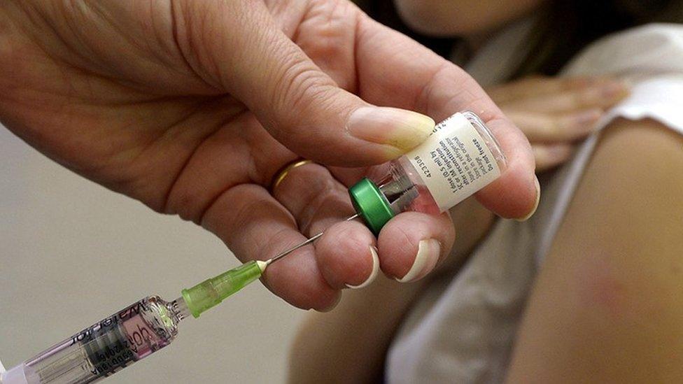 Child getting measles vaccination