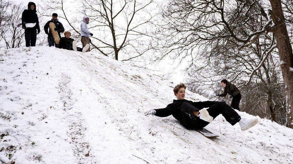 Children play in the snow in Denmark