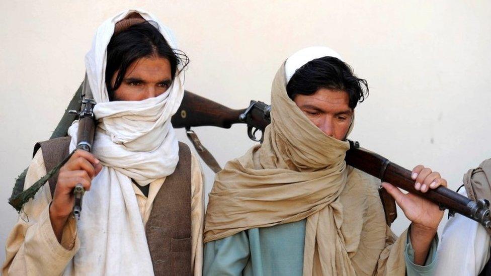 Alleged former Taliban fighters at a disarmament ceremony in Jalalabad, February 2016