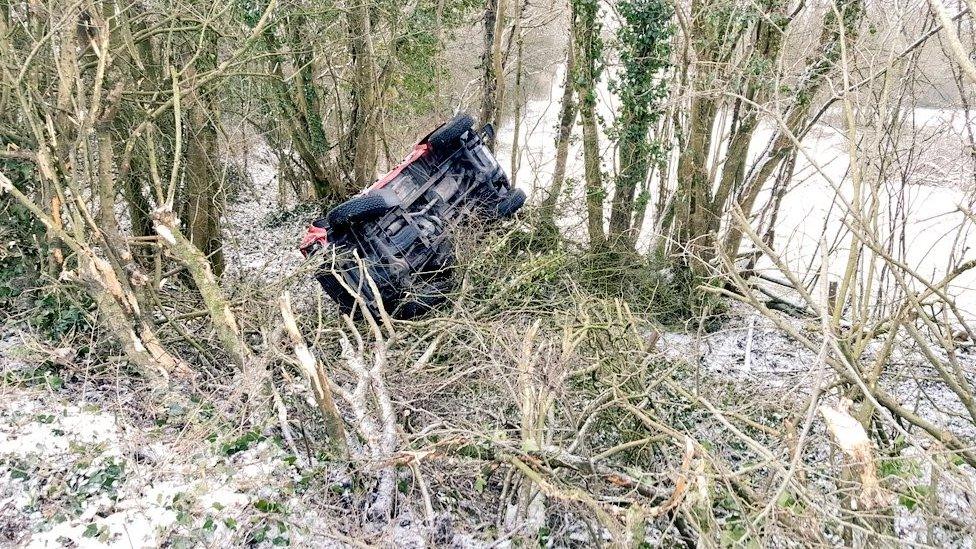 A 4x4 overturned in Bridgend