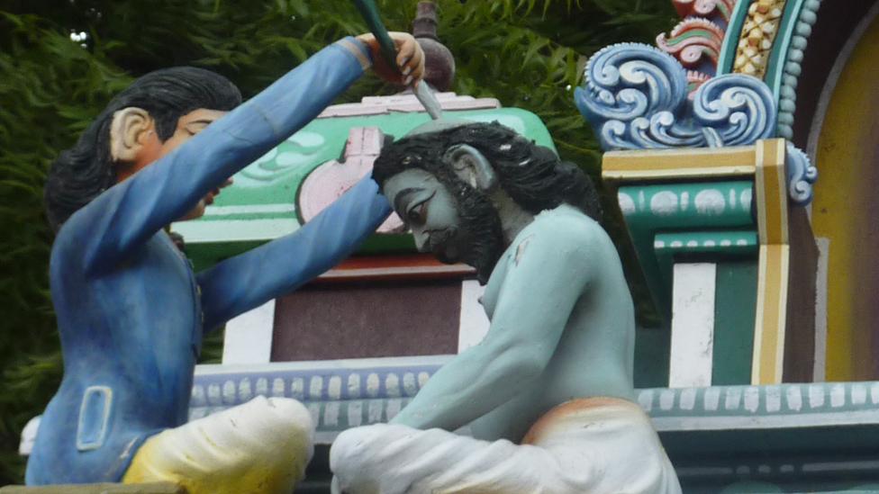 A statue on a Hindu temple reveals how tonsuring in an ancient tradition