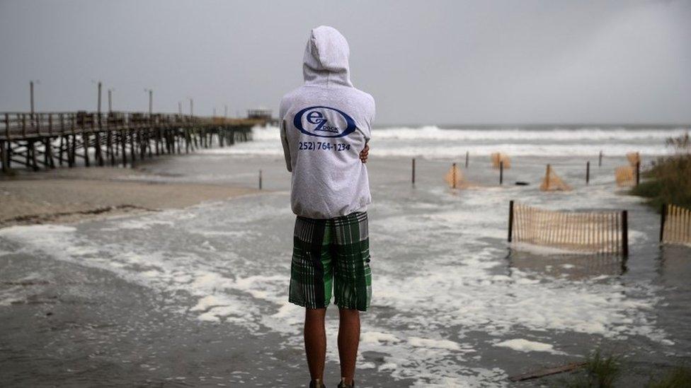 Man stares at sea