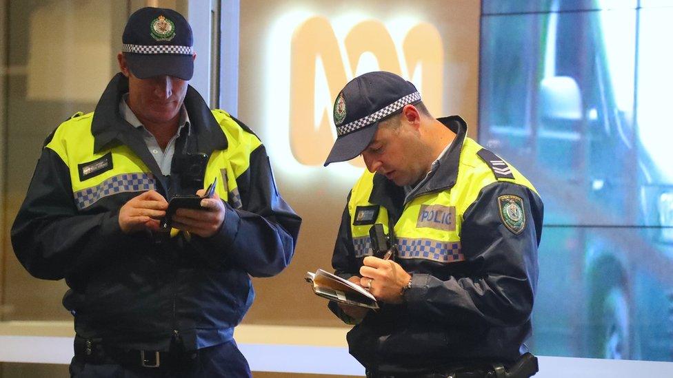 Police outside ABC office in Sydney