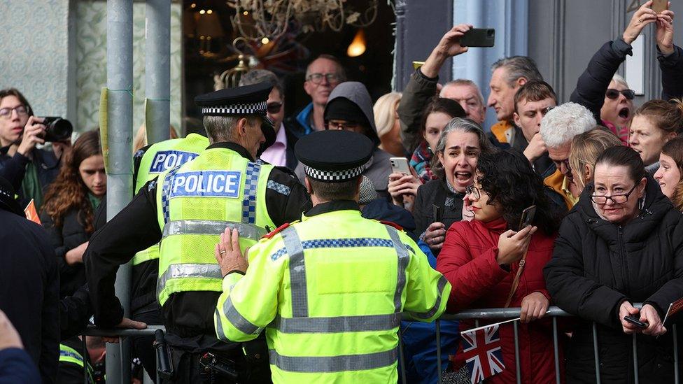 Police controlling crowd