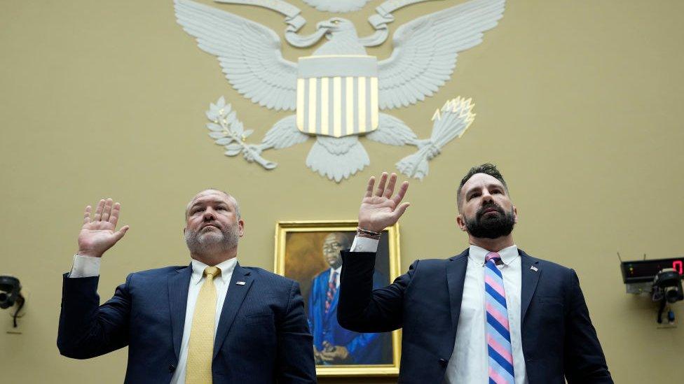 The two witnesses being sworn in