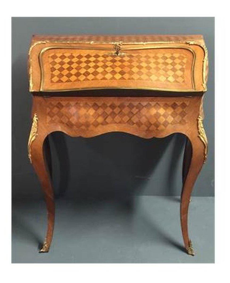 Mr Winton's ornate 1940s writing desk