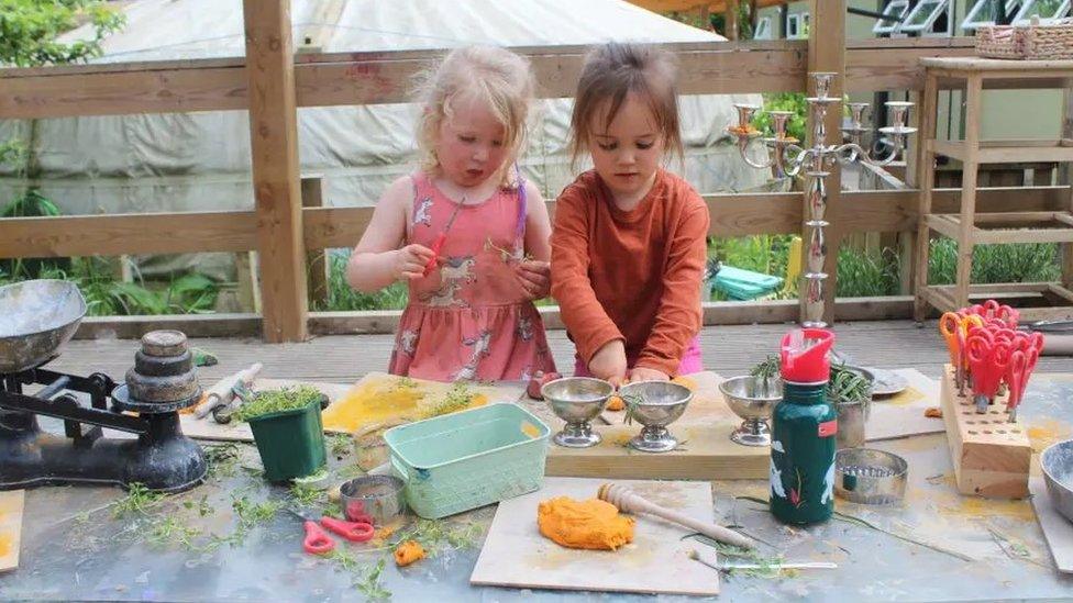 Children play at a nursery