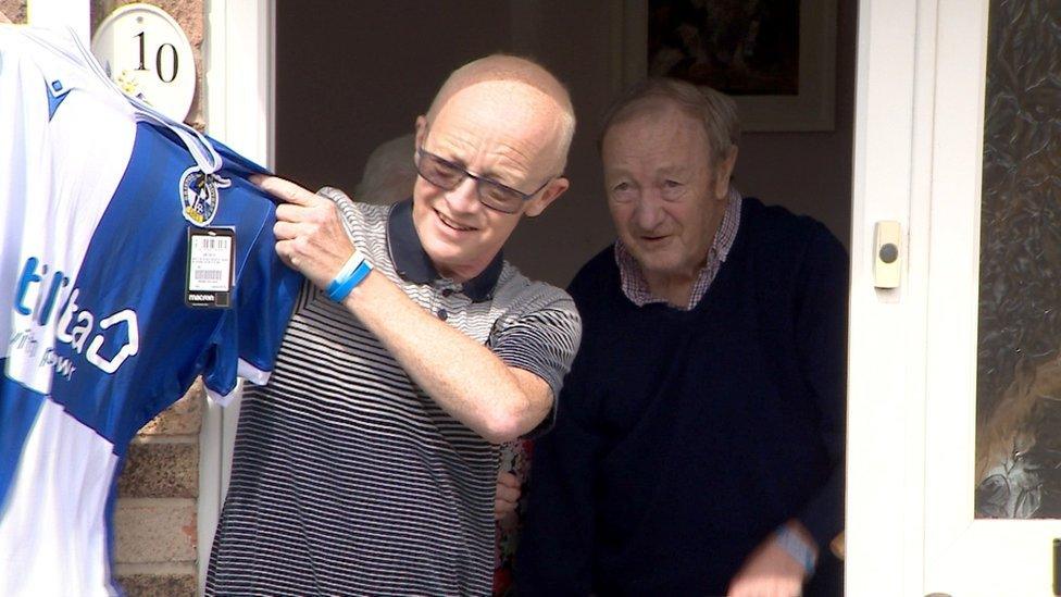 Steven Day (with shirt) and dad Frank