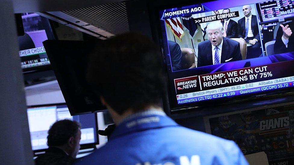 Donald Trump seen on TV screen on US trading floor