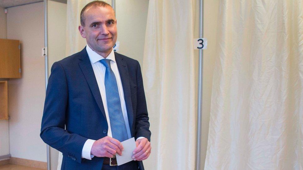 President Gudni Johannesson casts his ballot at a polling station in Reykjavik, on June 25, 2016.