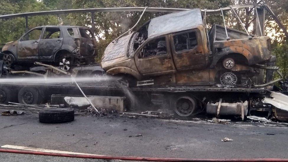 A car transporter was on fire on the carriageway