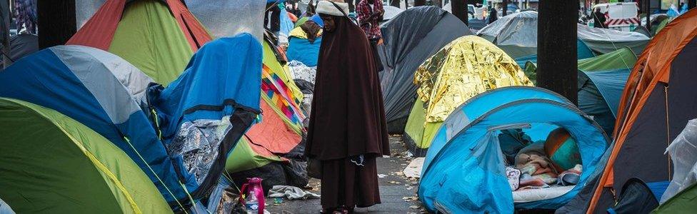 makeshift migrant camp in Paris