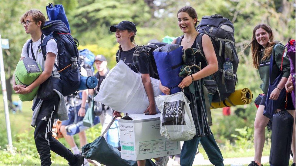 Festival goers arrive at Reading Festival