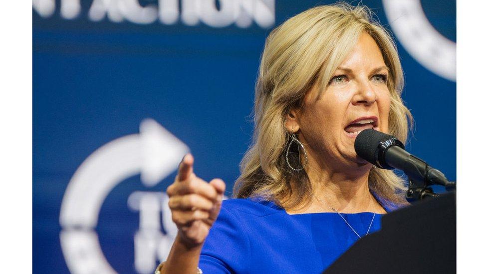 Arizona Chairwoman Kelli Ward speakers at microphone