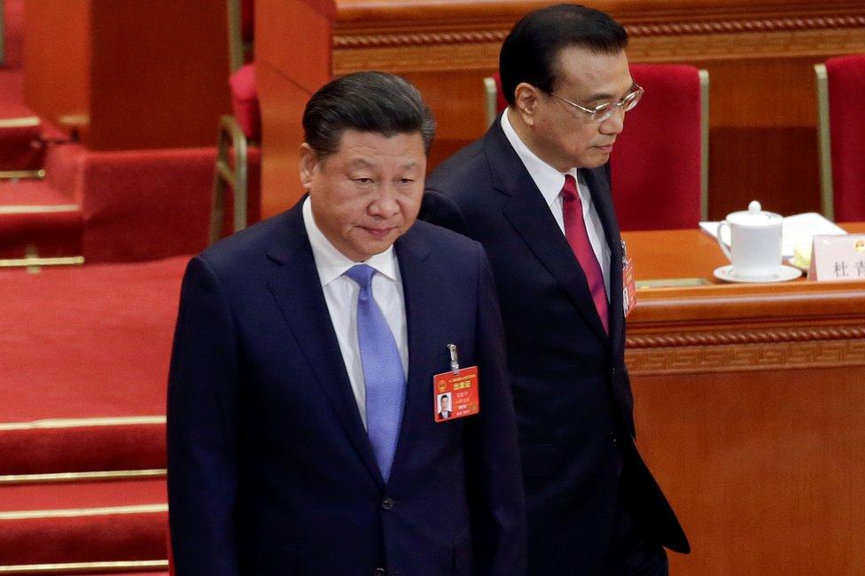 Chinese President Xi Jinping (left) and Premier Li Keqiang arrive for the congress in Beijing, 5 March