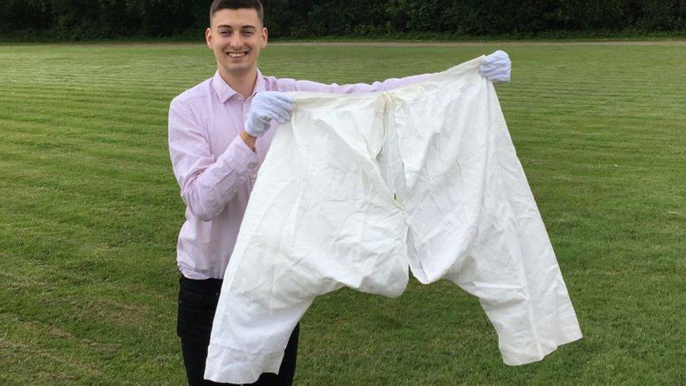 Queen Victoria's bloomers being held up