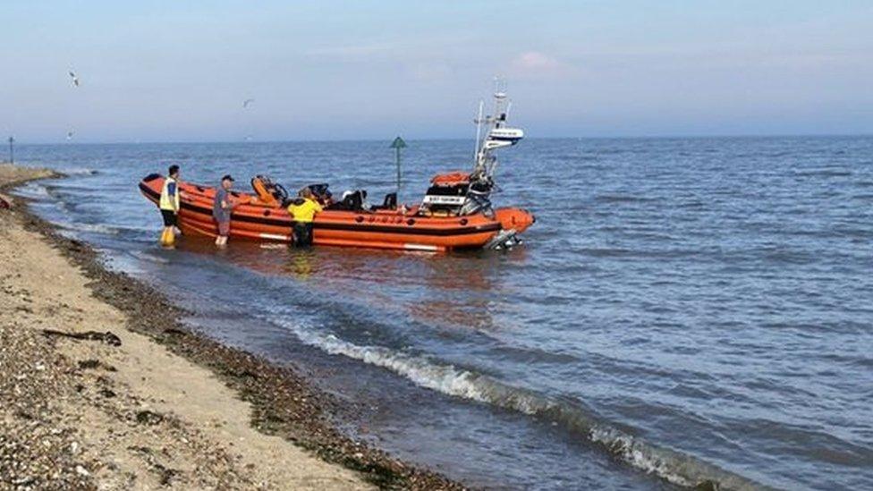 Beach rescue on West Mersea beach in Essex