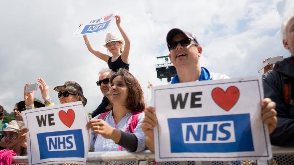 NHS supporters watch the action on the Pyramid Stage