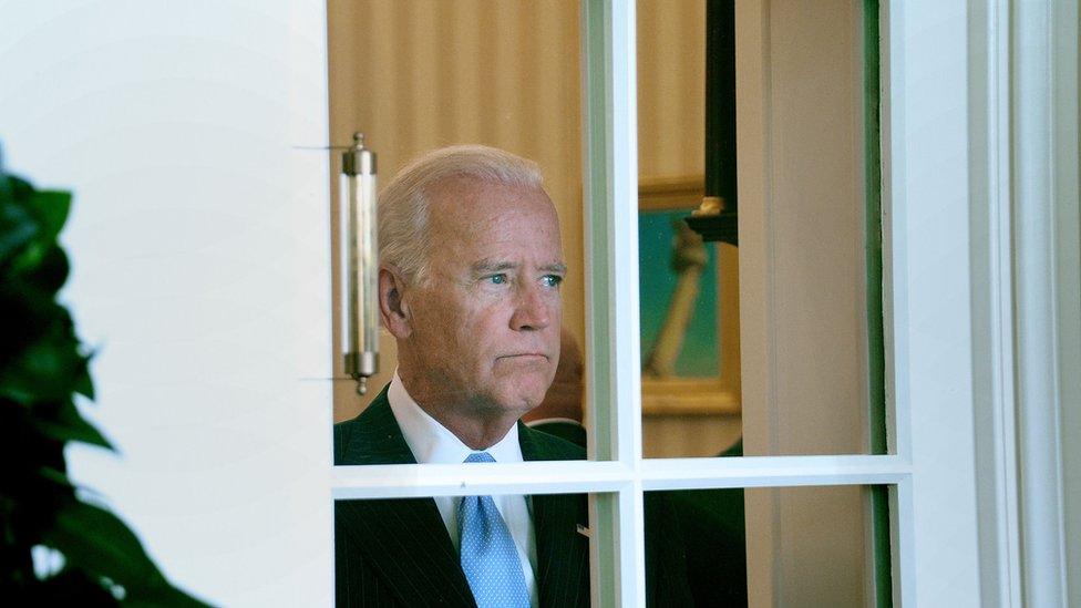 Joe Biden looking out of the window