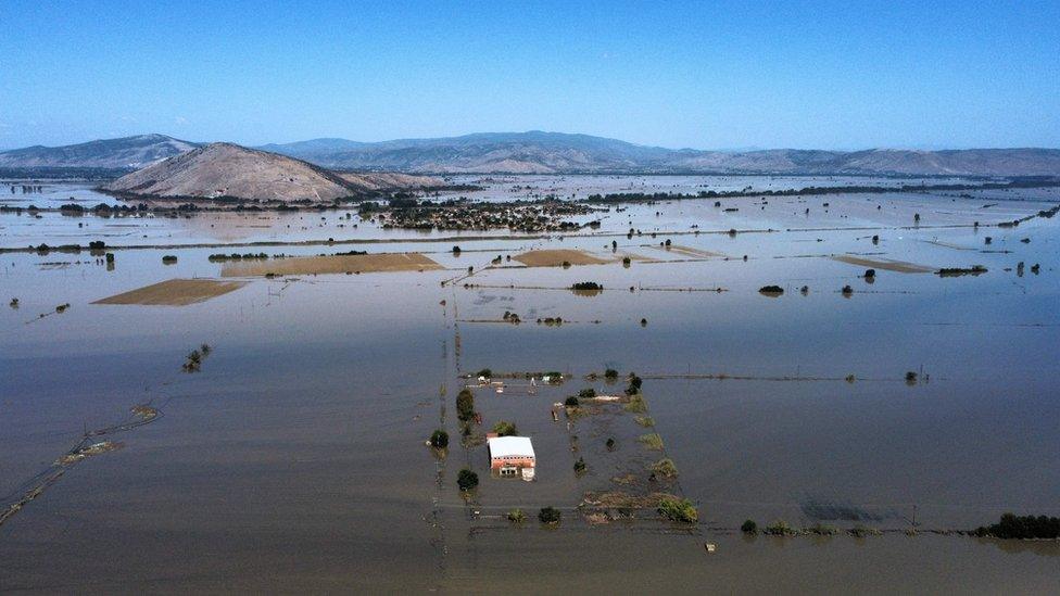 Landscape showing large areas of flooded farmland