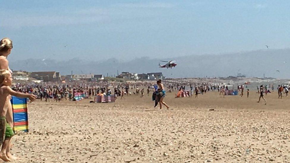 The rescue operation on the beach