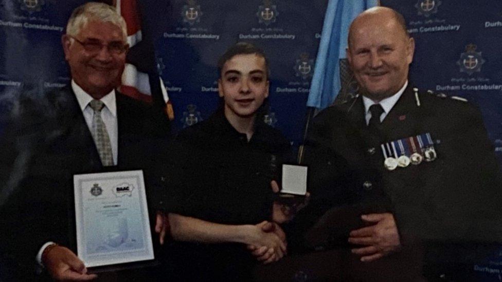 Scott Bowes (middle) as a Durham Police cadet, with the then Durham PCC Ron Hogg (left) and Chief Constable Mike Barton