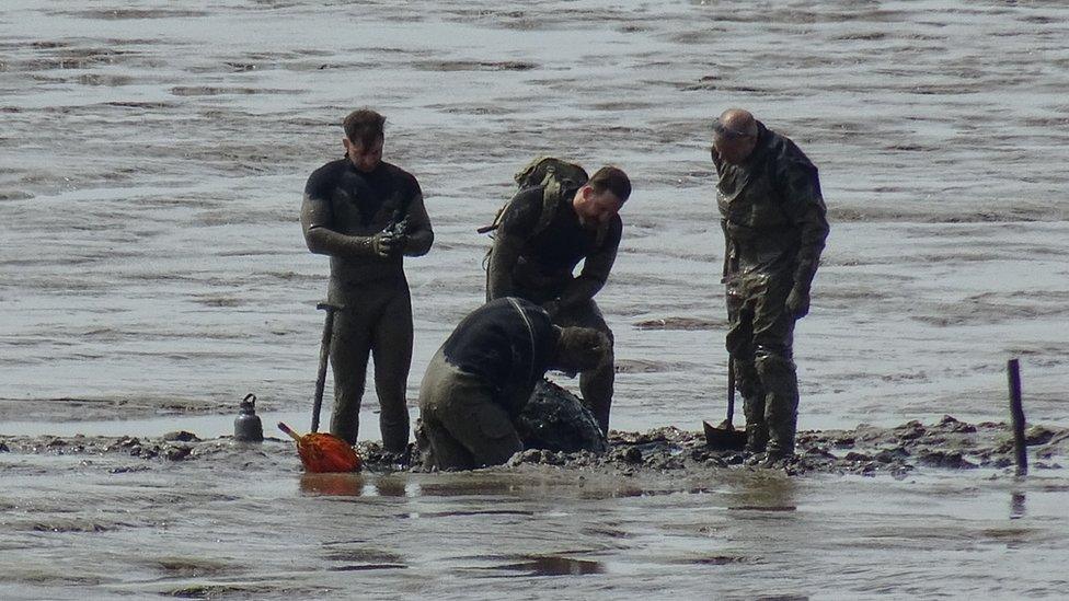 A Royal Navy bomb squad dug out the buoy