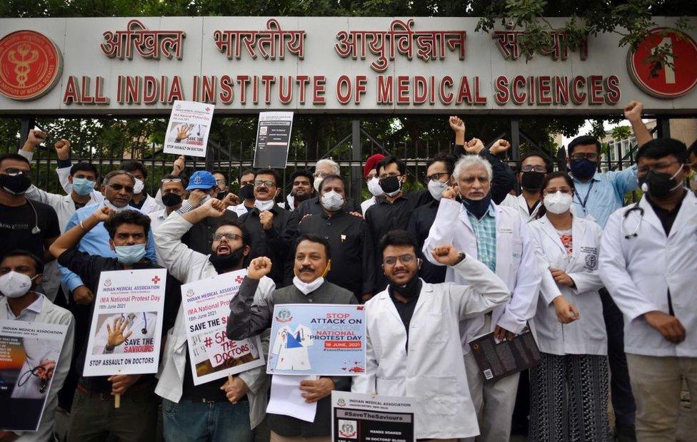 Members of Indian Medical Association (IMA) demonstrating with placards demanding a central law to protect doctors against violence, outside AIIMS on June 18, 2021 in Delhi, India.