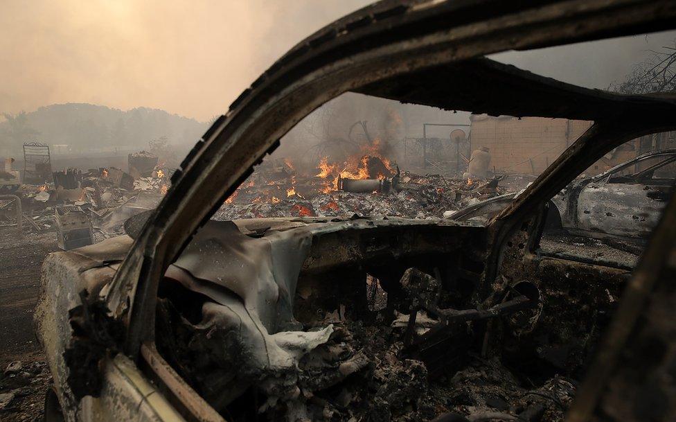 The remains of fire damaged homes after an out of control wildfire moved through the area on October 9, 2017 in Glen Ellen, California