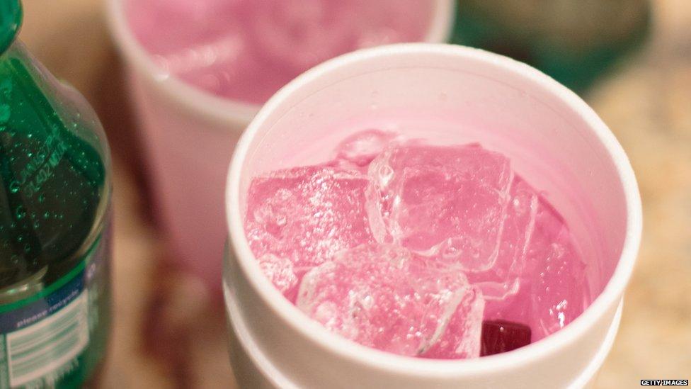 A cup of what appears to be lean - the drink is a mixture of Codeine-based cough syrup and sprite.