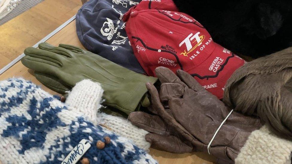 Gloves and warm hats on a table