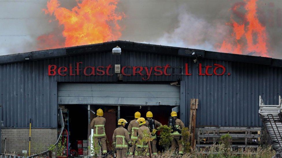 Fire crews tackle a blaze at a crystal factory