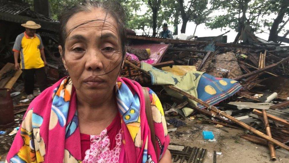 Rani beside her destroyed beachside stall in Anyer