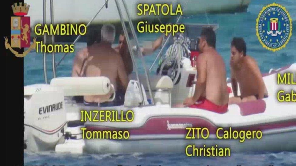 Police footage of suspects on a boat off Sicily