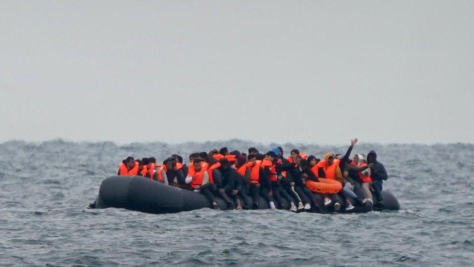 People crossing the Channel on board a small boat