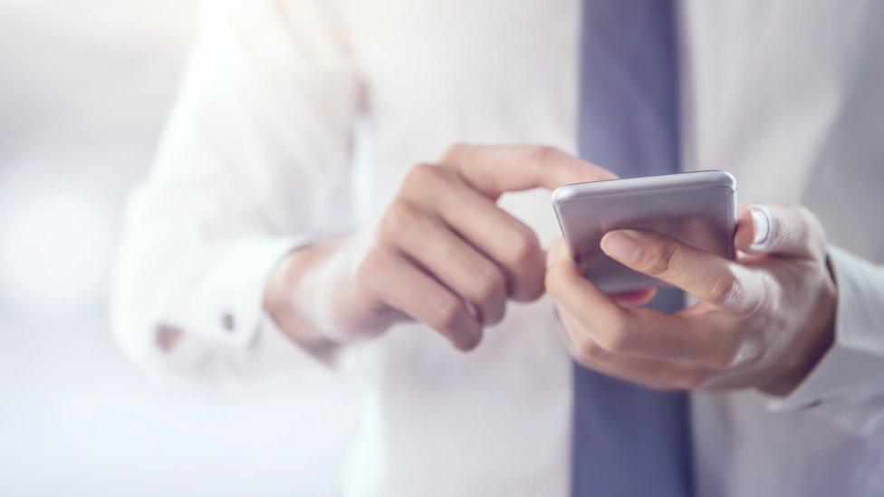 Businessman using mobile phone