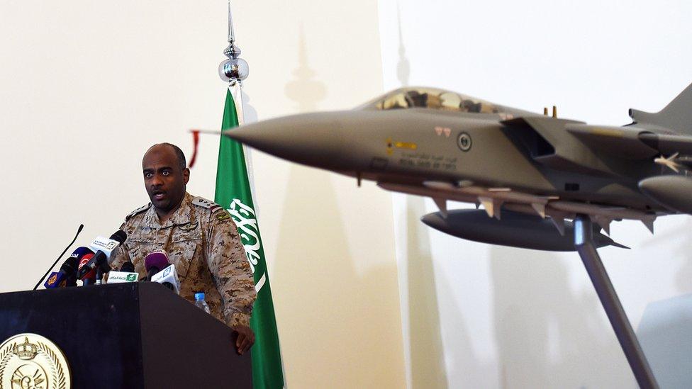 Saudi Brigadier General Ahmed Asiri, speaks to the media next to a replica of a Tornado fighter jet (March 2014)