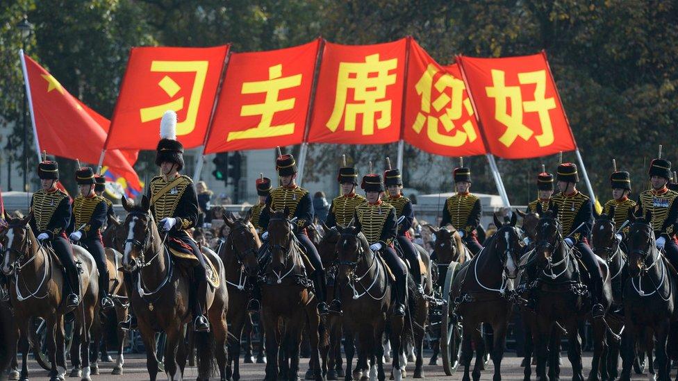 Members of the cavalry parade down the Mall