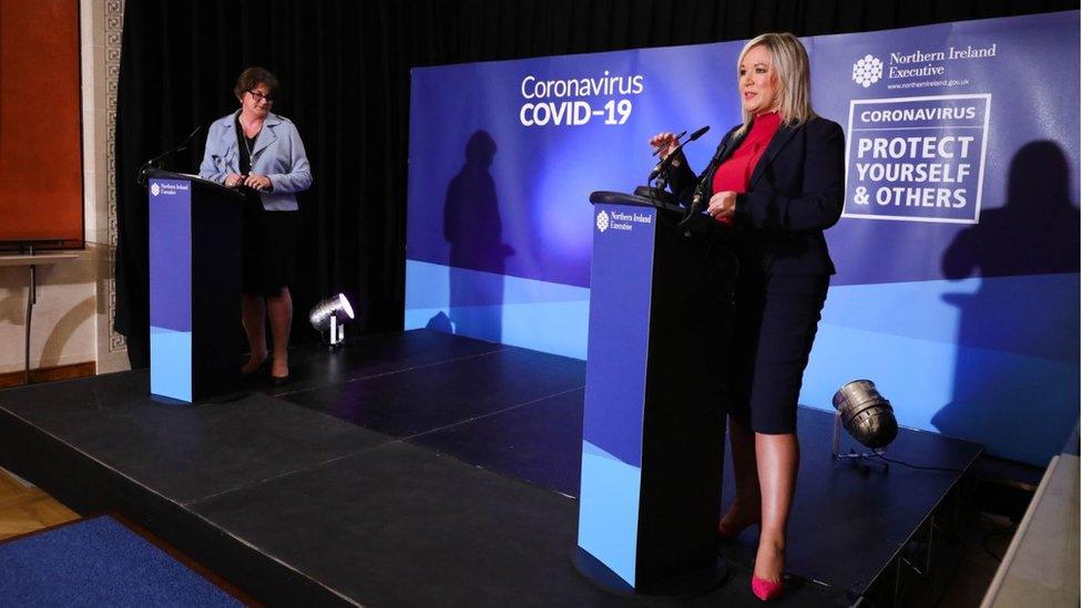 First Minister Arlene Foster (left) and Deputy First Minister Michelle O'Neill during one of their coronavirus media briefings at Parliament Buildings in Stormont, Belfast.