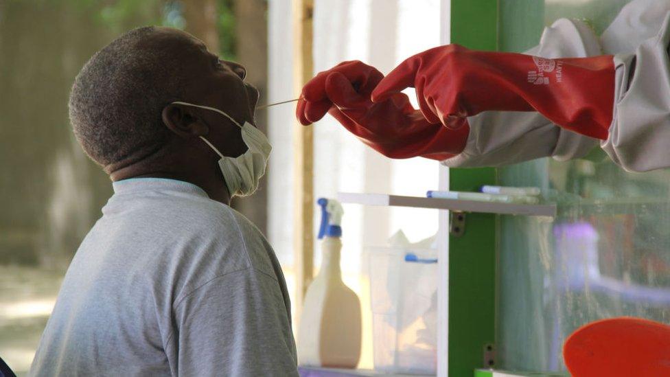 A patient who is suspected of suffering from COVID-19 coronavirus undergoes testing at the University of Maiduguri Teaching Hospital isolation centre on May 10, 2020